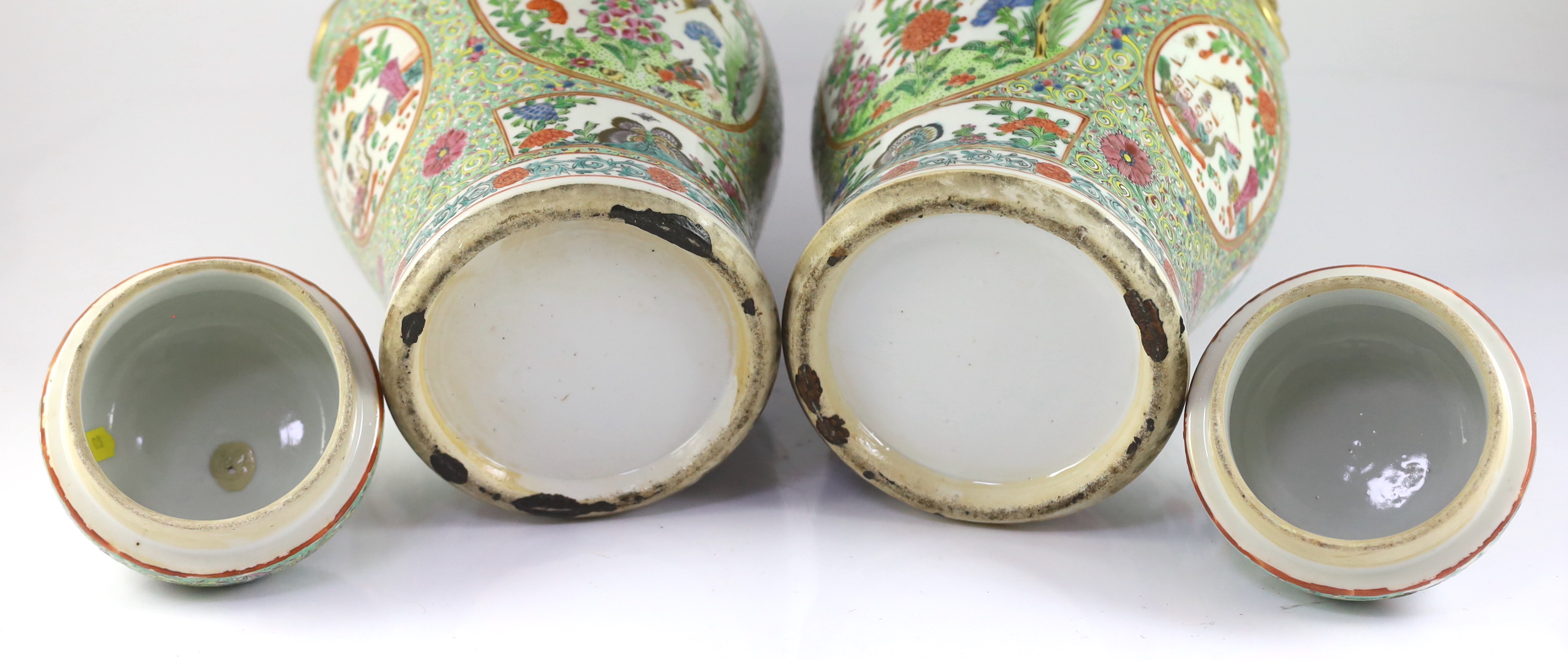 A pair of Chinese enamelled porcelain vases and covers, early 20th century